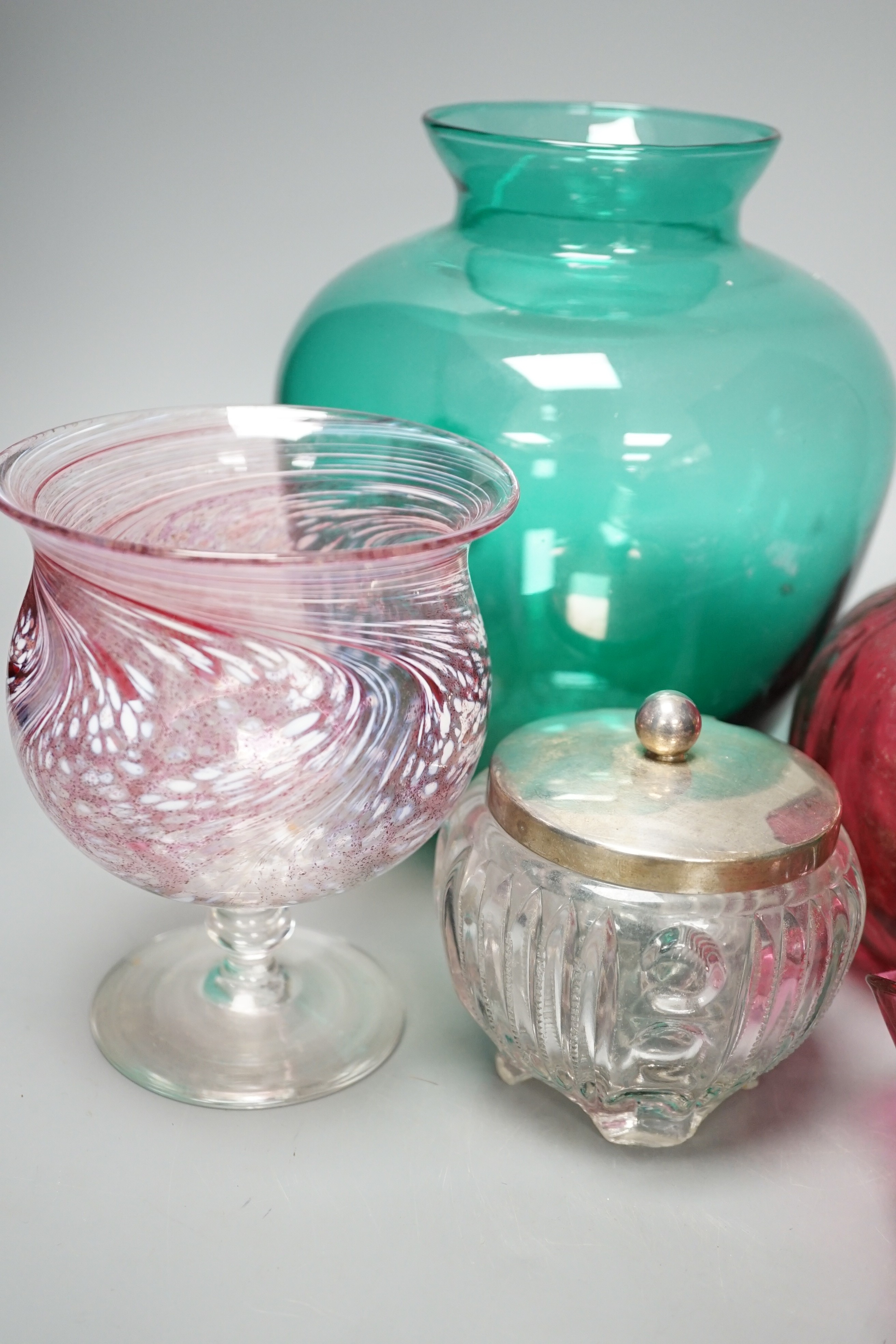 A collection of cranberry glass, a silver lidded glass sugar bowl, and enamelled glass historismus humpen etc